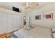 Bedroom with a queen bed, double closets and a view of the canal at 2878 Egret Ct, North Port, FL 34287