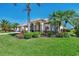 Single story home with tile roof and nicely landscaped yard at 2878 Egret Ct, North Port, FL 34287