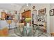 Kitchen features granite countertops and wood cabinets at 2878 Egret Ct, North Port, FL 34287