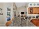 Kitchen with granite countertops, stainless steel appliances, and breakfast bar at 2878 Egret Ct, North Port, FL 34287