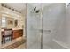 Walk-in shower with glass enclosure and built-in seat at 2878 Egret Ct, North Port, FL 34287