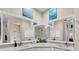 Bathroom vanity with double sinks, mirrors, and white cabinetry at 3200 Rowland Dr, Punta Gorda, FL 33980