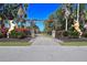 Gated entrance to Tall Palms Ranch with horse statues and lush landscaping at 3200 Rowland Dr, Punta Gorda, FL 33980
