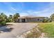 Front exterior of the single-story home with a covered entryway at 3200 Rowland Dr, Punta Gorda, FL 33980