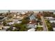 High-angle shot of a house in a coastal neighborhood near the beach at 413 Gulf Dr, Venice, FL 34285