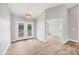 Bright and airy entryway with wood-look tile flooring at 441 Boundary Blvd, Rotonda West, FL 33947