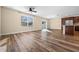 Bright and airy living room with hardwood floors and ceiling fan at 4861 Silver Topaz St, Sarasota, FL 34233