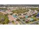 Community overview showcasing homes, pool, and lush green spaces at 5255 Athens Way, Venice, FL 34293