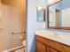 Guest bathroom with single vanity and walk-in shower at 5255 Athens Way, Venice, FL 34293