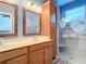 Double vanity bathroom with a walk-in shower at 5255 Athens Way, Venice, FL 34293