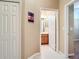 Bathroom with shower/tub combo and wood vanity at 5255 Athens Way, Venice, FL 34293