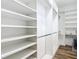 Large walk-in closet with ample shelving and hanging space at 5255 Athens Way, Venice, FL 34293