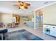 Open dining area with view into living and kitchen areas at 5255 Athens Way, Venice, FL 34293