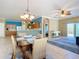 Bright dining room with kitchen views at 5255 Athens Way, Venice, FL 34293