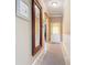 Light and spacious entryway with a large mirror and neutral color scheme at 5255 Athens Way, Venice, FL 34293