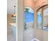 Beach-themed entryway with a decorative mural and mirror at 5255 Athens Way, Venice, FL 34293