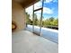 Relax on this screened patio with tranquil views of lush greenery and blue skies at 5255 Athens Way, Venice, FL 34293