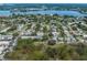 High-angle view of the neighborhood with surrounding homes and green spaces at 533 Parkdale Mews # 533, Venice, FL 34285