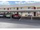 Covered parking area for residents, offering protection from the elements at 533 Parkdale Mews # 533, Venice, FL 34285