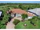 Single-Gathering home with tile roof and manicured lawn at 535 Westmount Ln, Venice, FL 34293