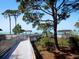 Wooden walkway leading to beach with ocean view at 535 Westmount Ln, Venice, FL 34293