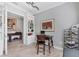 Office space with unique decor, French doors, light flooring and plentiful natural light at 5584 Cantucci St, Nokomis, FL 34275
