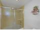 Simple bathroom with shower and bath at 629 Alhambra Rd # 704, Venice, FL 34285
