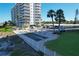 Outdoor shuffleboard court with benches and ample parking at 629 Alhambra Rd # 704, Venice, FL 34285