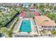 Resort-style community with pool, tennis courts, and canal at 6415 Midnight Pass Rd # 206, Sarasota, FL 34242