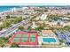 Complex overview showing tennis courts, pool, and surrounding area at 6415 Midnight Pass Rd # 206, Sarasota, FL 34242