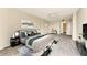 Main bedroom with ceiling fan and access to a balcony at 6415 Midnight Pass Rd # 206, Sarasota, FL 34242