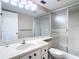 Clean bathroom with shower, toilet, and vanity at 758 Village Cir # 106, Venice, FL 34292