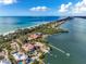 Coastal living at its finest. Aerial view of a waterfront property with ocean access at 7825 Manasota Key Rd, Englewood, FL 34223