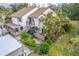 Elevated perspective of condo nestled amidst tropical foliage and greenery at 864 Bird Bay Way # 195, Venice, FL 34285