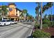 Lined with palm trees, this street shows Bank of America and other businesses at 887 Morgan Towne Way, Venice, FL 34292