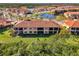 Aerial view showcasing home's backyard and community at 10039 Crooked Creek Dr # 203, Venice, FL 34293