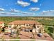 A charming multi-Gathering home boasts a tile roof, garages, and a beautifully landscaped yard at 10039 Crooked Creek Dr # 203, Venice, FL 34293
