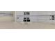 Kitchen island features a stainless steel faucet and white countertops at 10039 Crooked Creek Dr # 203, Venice, FL 34293
