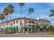 Charming shops and restaurants with awnings line the street at 1211 Capri Isles Blvd # 58, Venice, FL 34292