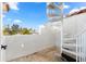 Spiral staircase leading up to a private balcony or rooftop deck at 130 Green Dolphin Dr, Placida, FL 33946
