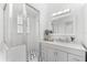 Bright, clean bathroom with a shower, modern vanity, and tiled floor at 130 Green Dolphin Dr, Placida, FL 33946