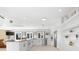 Bright, updated kitchen with white cabinets, granite countertops, and stainless steel appliances at 130 Green Dolphin Dr, Placida, FL 33946