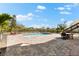 Relaxing pool area with ample patio space, lounge chairs, and surrounding greenery at 130 Green Dolphin Dr, Placida, FL 33946