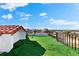 Rooftop patio with artificial turf and scenic views at 130 Green Dolphin Dr, Placida, FL 33946