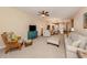 Inviting living room with comfortable seating, a decorative rug, and coastal-inspired decor at 157 Tampa E Ave # 807, Venice, FL 34285