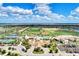 Resort-style pool and clubhouse with tennis courts at 17118 Vardon Ter # 202, Bradenton, FL 34211