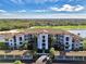 Luxury condo building with golf course and lake views at 17118 Vardon Ter # 202, Bradenton, FL 34211
