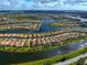Aerial view showcasing home and surrounding area's waterfront location at 19279 Jacinda St, Venice, FL 34293