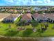 Aerial view of a house near a lake at 19279 Jacinda St, Venice, FL 34293