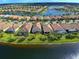 Aerial view showing house location in community at 19279 Jacinda St, Venice, FL 34293